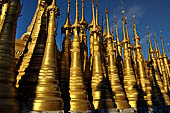 Inle Lake Myanmar. Indein, on the summit of a hill the  Shwe Inn Thein Paya a cluster of hundreds of ancient stupas. Many of them are ruined and overgrown with bushes. 